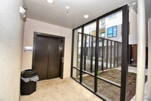 Photo of the entrance to building with elevator